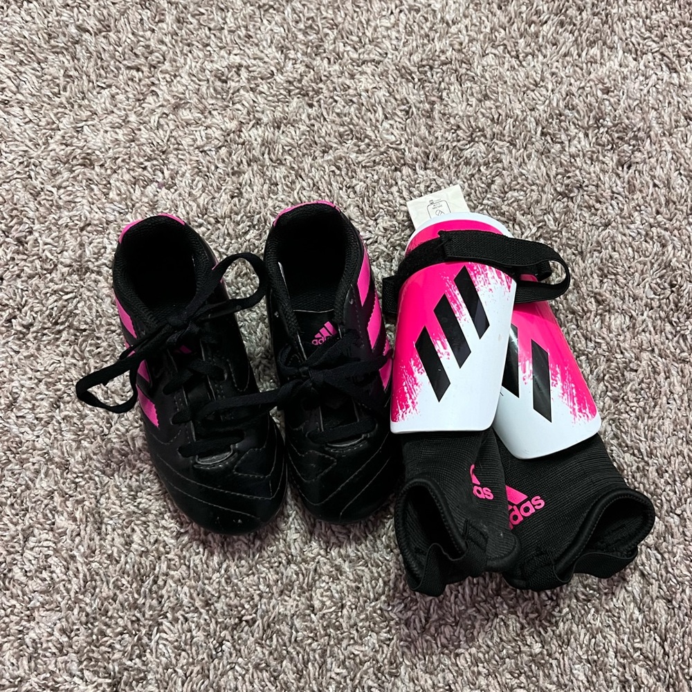 Adidas soccer cleats and shinguards